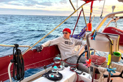 yacht-delivery-crew-on-watch-scaled